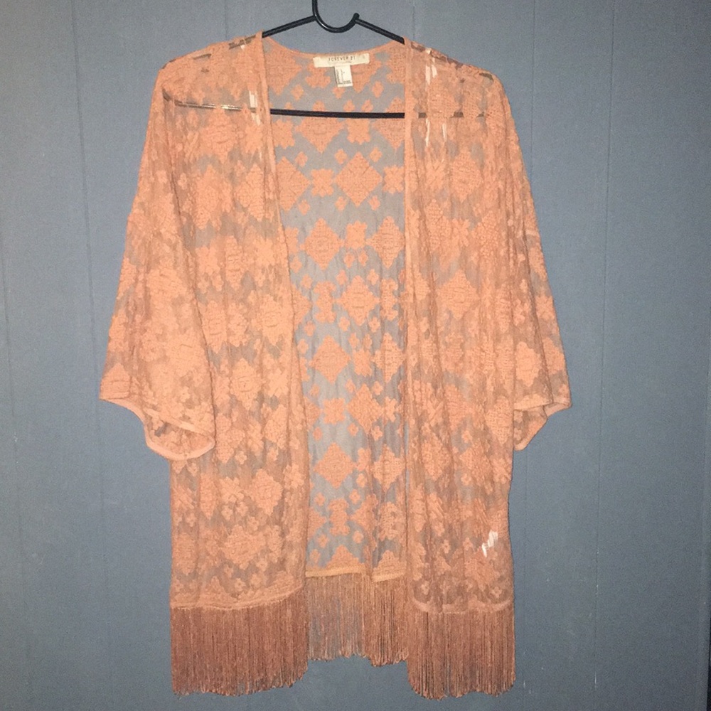 A peach/orange cover up